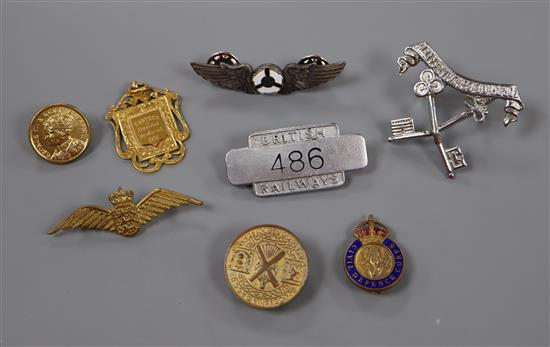 A 9ct gold Croydon Musical Festival 1915 shield-form pendant, a BR badge and sundry other badges.